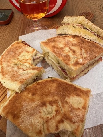 A juicy Prego sandwich, garlic-marinated steak nestled in a crusty Portuguese roll