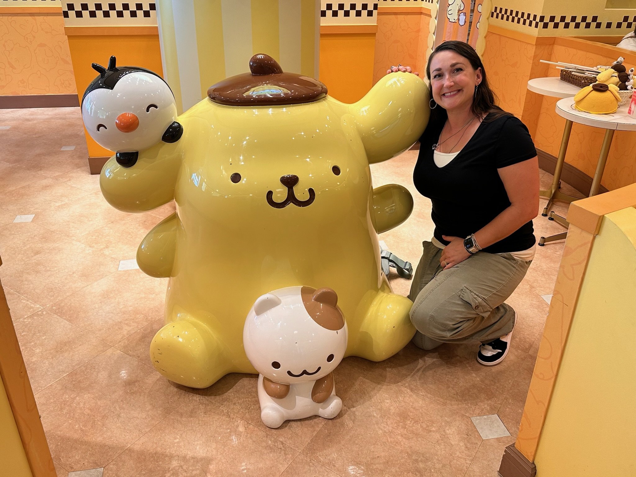 The whimsical Pompompurin-themed interior of the cafe in Harajuku